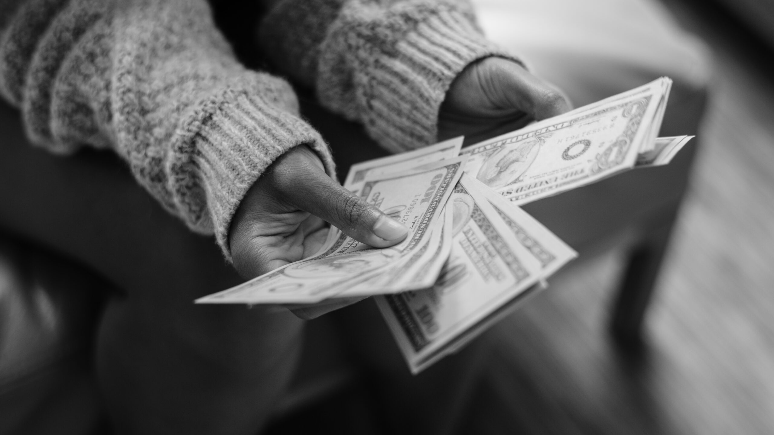 Closeup of woman counting money