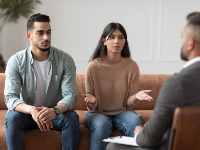 Portrait,Of,Serious,Young,Lady,Talking,To,Psychologist,Counselor,Complaining